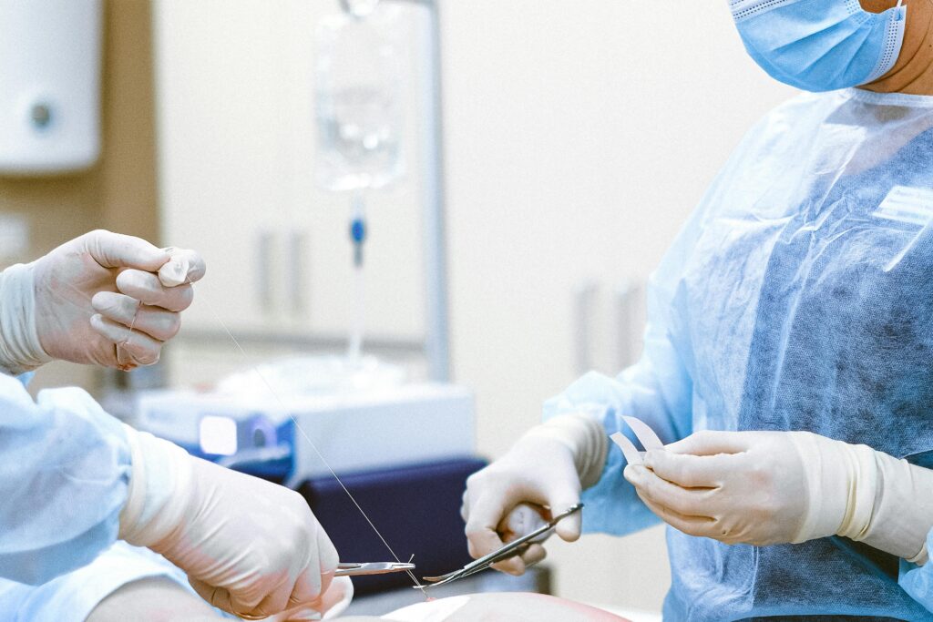 pexels-photo-4483327-4483327 Photo of Medical Professionals Wearing Personal Protective Equipment